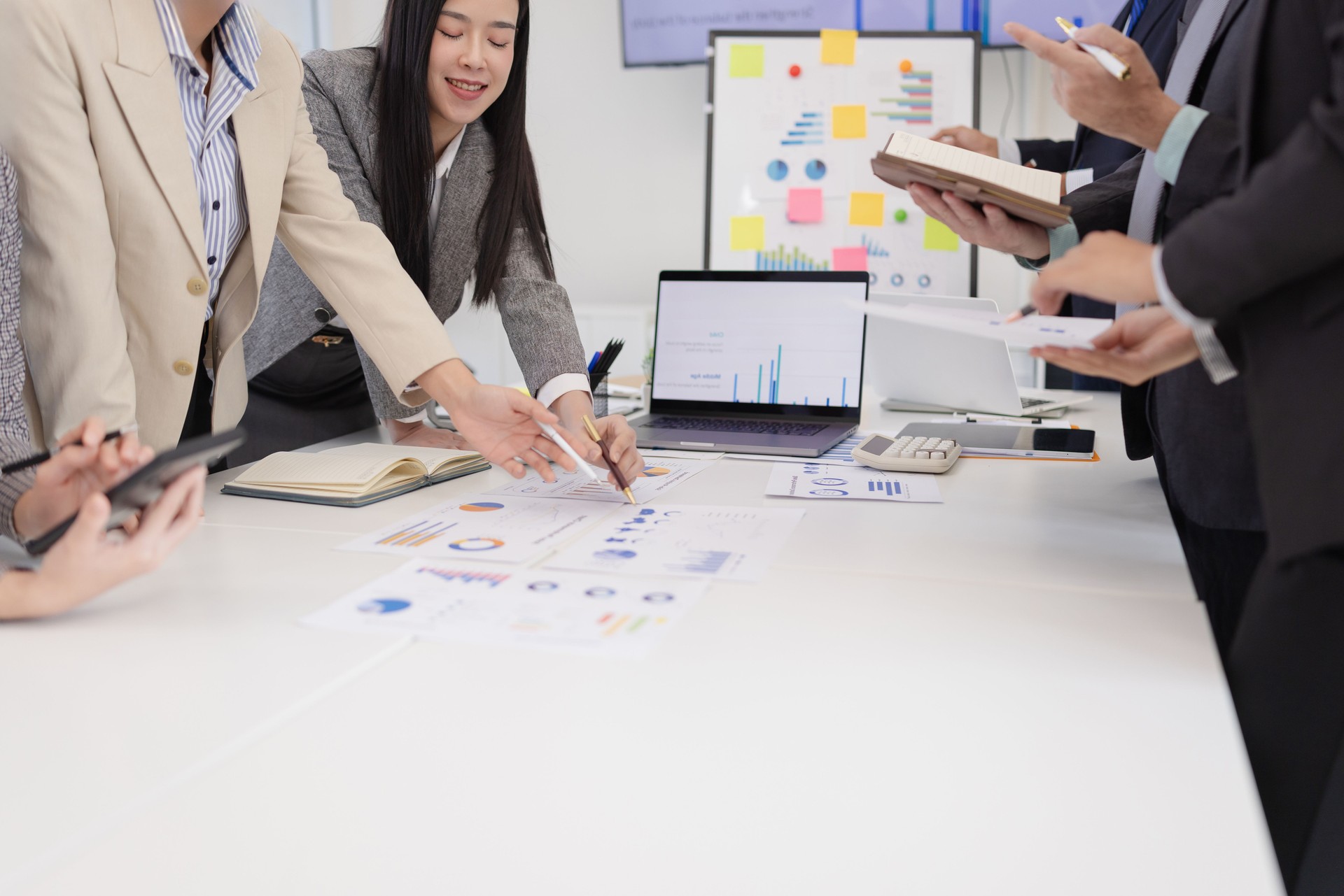 Group of businesspeople working plan analysis project brainstorm in modern office